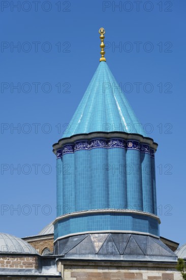 Detail of a turquoise dome in Islamic architecture under a blue sky, Mevlana Museum, Mevlana,