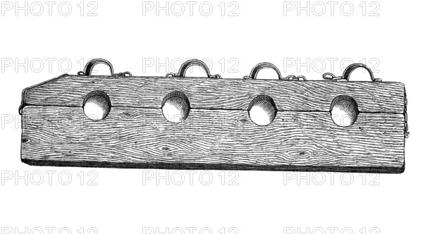 Instrument of torture: The stick - The prisoner had to put his legs through the holes, his arms