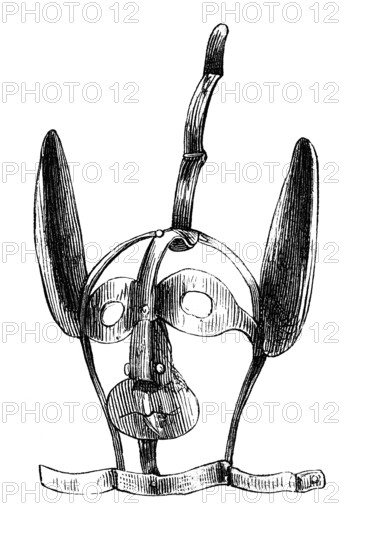 Instruments of torture: Schandlarva, punishment mask, woodcut from 1864