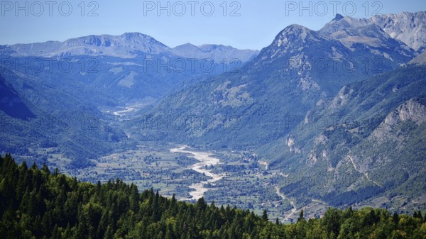 View of a mountain valley with a river surrounded by forests and mountains, Peaks of the Balkans,