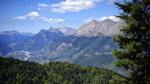 Impressive mountain landscape surrounded by green forests and clear skies, Peaks of the Balkans,