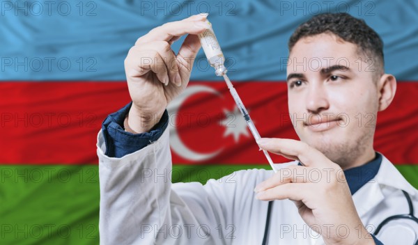 Doctor holding syringe on Azerbaijan flag background. Medical professional holding syringe with