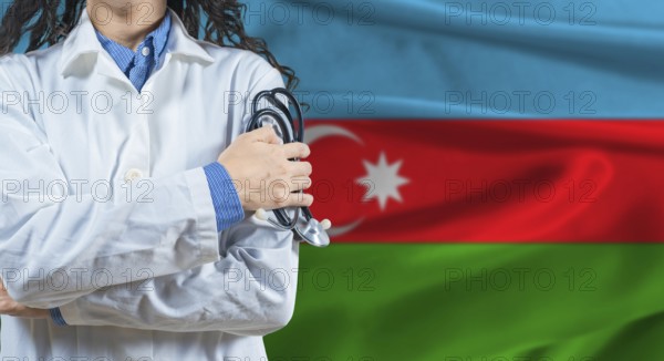 Healthcare professional with Azerbaijan flag background. Professional doctor holding stethoscope on