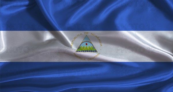 Nicaragua flag with cloth textured background. National flag of Nicaragua with realistic texture