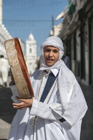 Tripoli, Libya, North Africa. A young man in traditional clothes in the historic quarter with