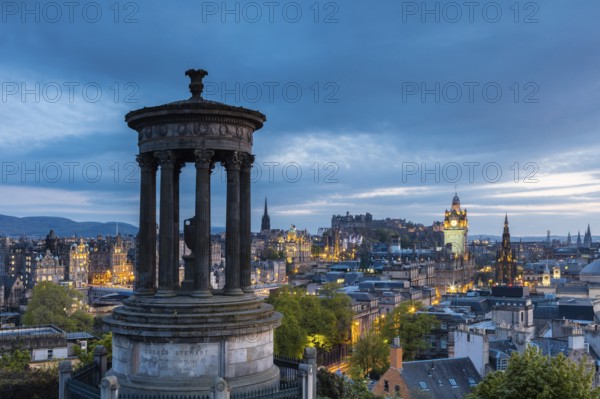 Edinburgh, Scotland, UK. The Dugald Stewart Monument on Calton Hill overlooking the old town in the