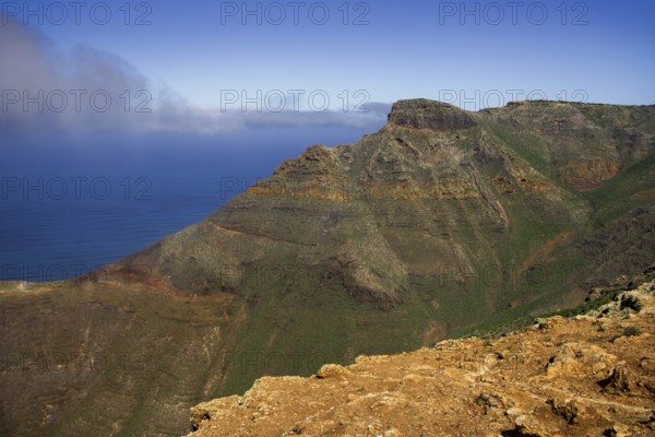 Magnificent view from the Mirador de Ermita de Las Nieves of the sea and the mountain wall of the