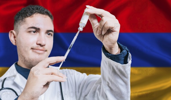 Doctor holding syringe on Armenia flag background. Medical professional holding syringe with