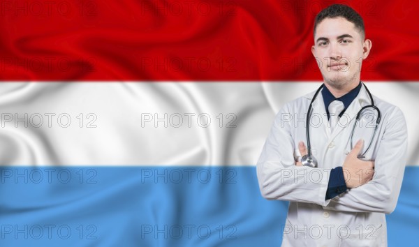 Portrait of medical professional on Luxembourg flag background. Luxembourgish national health