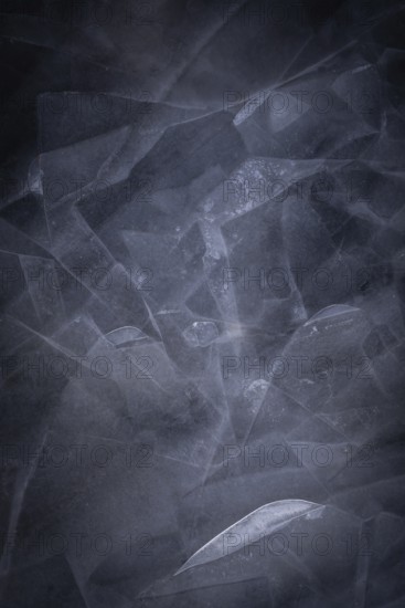Ice sheets form abstract pattern on a frozen lake, ice, winter, Finland