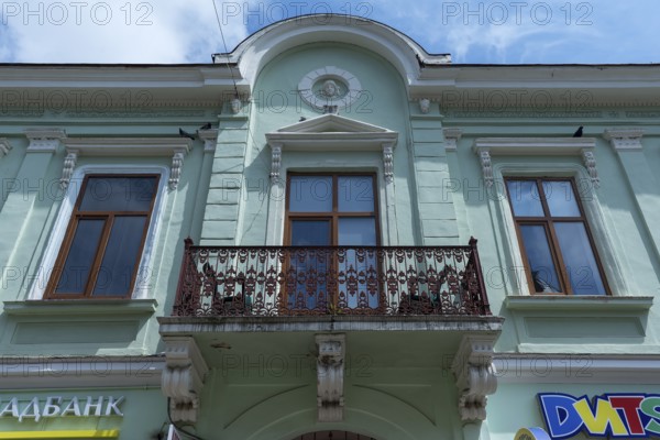 Renovated house, 19th century, with rusty balcony, Czernowicz, Ukraine