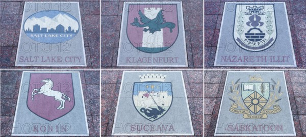 Six floor plates, coats of arms of various European countries on the central square in Czernowicz,