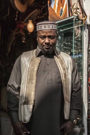 Misurata, Libya, North Africa. A Libyan man from one of the numerous desert tribes in his shop in