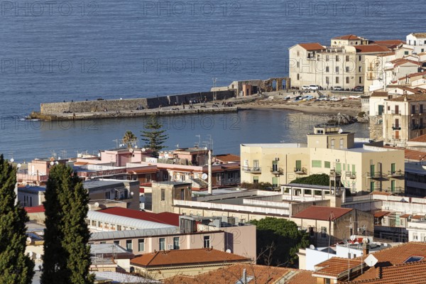 View of Cefalù in winter, view over the rooftops of the harbor and the Tyrrhenian Sea, medieval old
