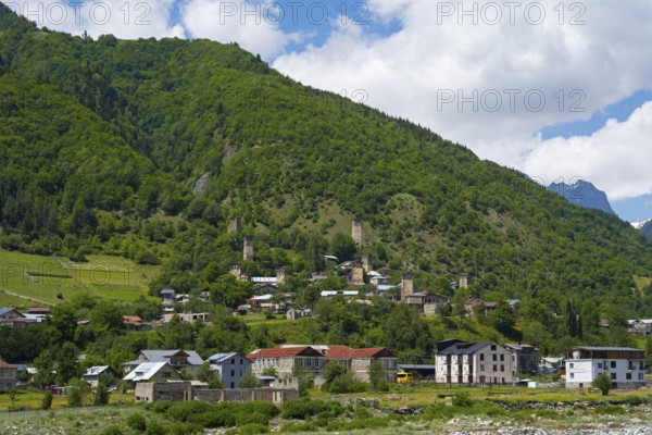 Picturesque village on a mountainside surrounded by lush greenery and mountains, Mestia, Mingrelia