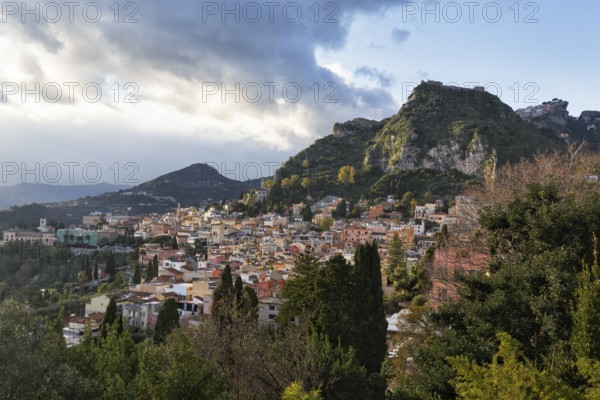 View of picturesque town, hills and mountains, panoramic view, Taormina, Sicily, Italy