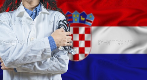 Healthcare professional with Croatia flag background. Professional doctor holding stethoscope on