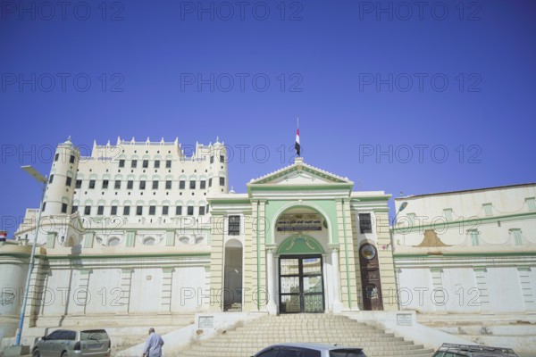 In Seiyun, Yemen, on January 15, 2026, the national flag of Yemen flies over a government building