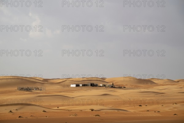 Bedouin camp in the sand dunes in the Wahiba Sands desert, Oman