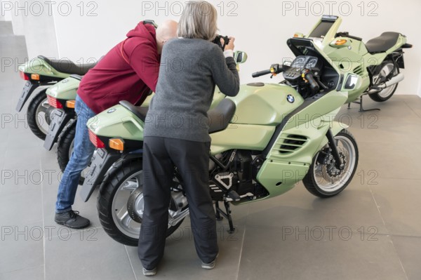 Photographers taking pictures of BMW motorcycles, Bavaria, Germany