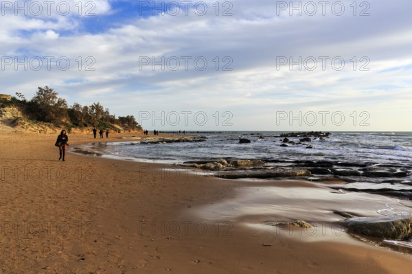 Stroller on the beach, Lido Scala dei Turchi, coastline, Realmonte, Agrigento, Sicily, south coast,