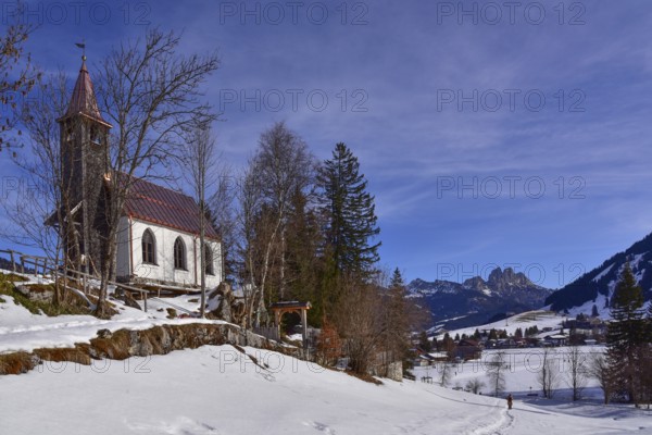 The Lourdes Chapel above Tannheim in the background the Rote Flüh, the Gimpel and the Köllnspitze,
