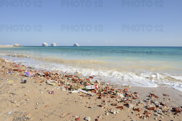 Beach with washed up trash, Hurghada, Red Sea Governorates, Egypt