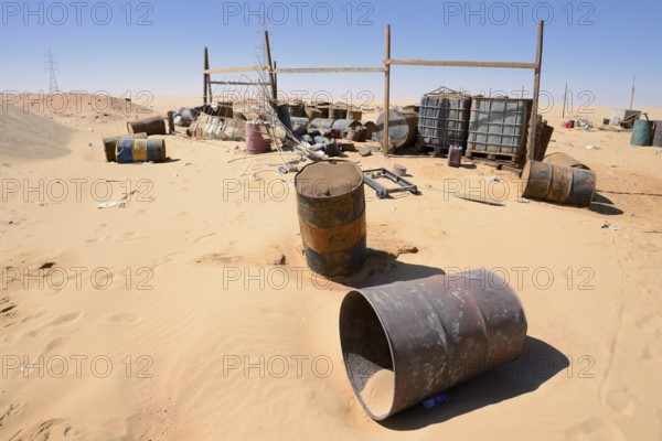 Empty kerosene barrels at a gas station in the Arabian Desert, Egypt