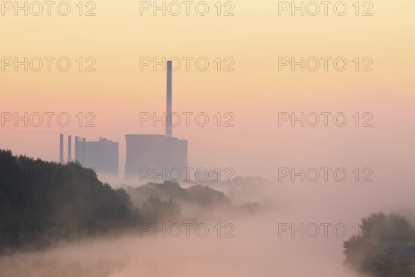 Datteln-Hamm Canal and Gersteinwerk power plant in morning fog at sunrise, Bergkamen, North