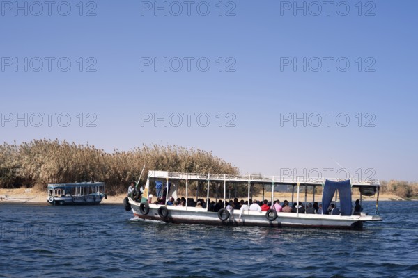 Sightseeing boat on the Nile, Aswan, Egypt