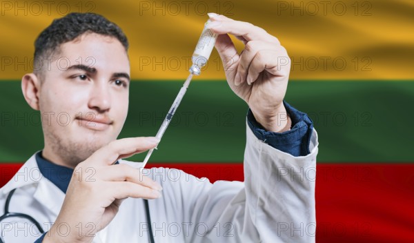 Doctor holding syringe on Lithuania flag background. Medical professional holding syringe with