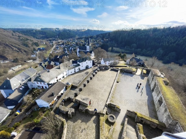 View from preserved castle tower to castle ruins Burghof restored preserved foundations remains of