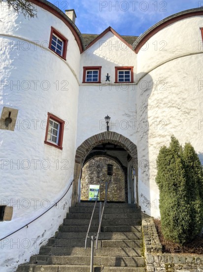 View of stairs to east gate passage into preserved inhabited bailey of medieval hill castle