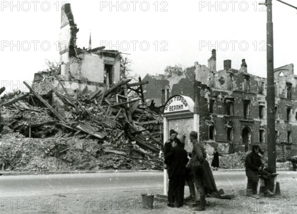 Destroyed homes, civilians and Soviet soldiers, June 1945, Berlin, Germany