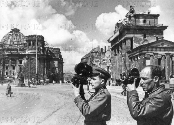 Soviet reporters, journalists with film cameras in front of the Brandenburg Gate, June 1945,