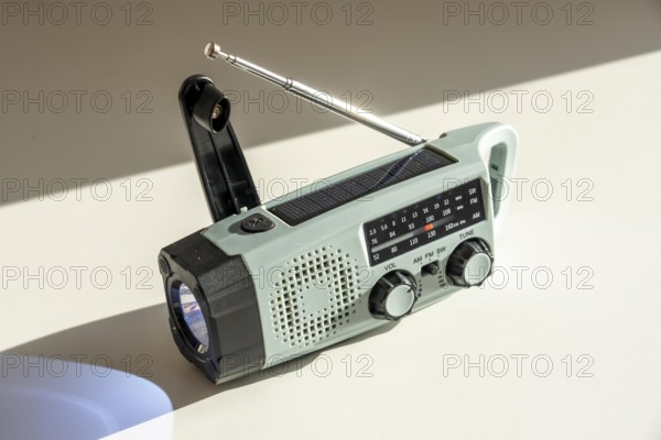 Radio with crank mode, by turning the crank we generate electricity in a dynamo, which charges a