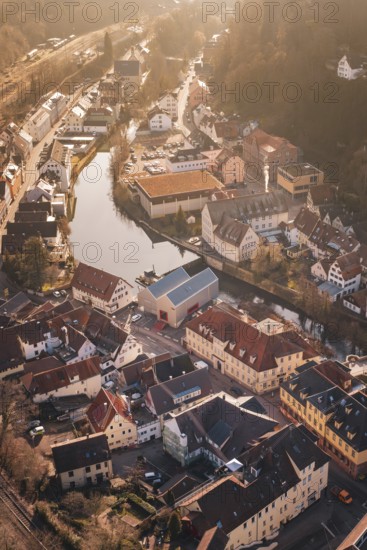 Historic city on a river, surrounded by trees and old buildings, test trip on the new Hermann-Hesse