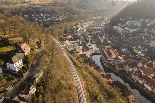 City landscape with train tracks and river from a bird's eye view, measurement trip on the new