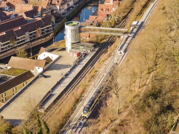 Train line with bridge near city center, embedded in fascinating architecture, test run on the new