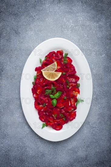 Salmon gravlax with beetroot, Scandinavian snack, beet gravlax, lightly salted fish, homemade, no