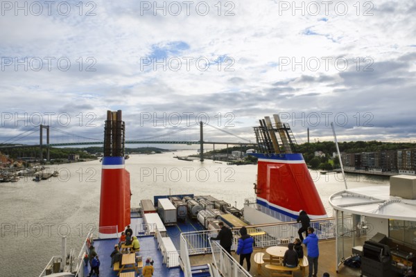 View from ship deck of a bridge and surrounding countryside on a cloudy day, Stena Line