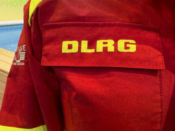 Press photo of DLRG logo on combat clothing from Deutsche Lebens-Rettungs-Gesellschaft e.V.,