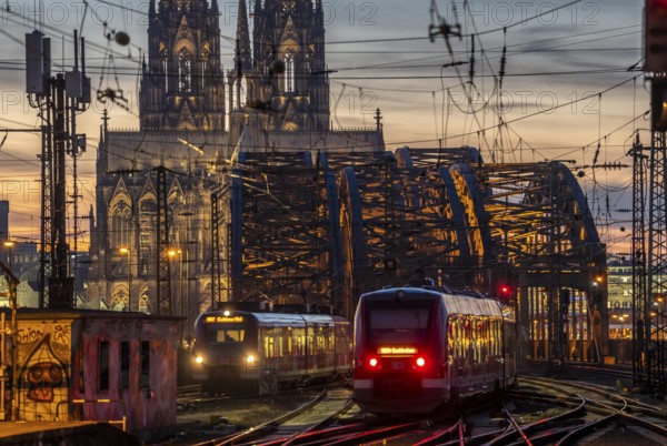 Rail track in front of Cologne Central Station, Hohenzollern Bridge across the Rhine, regional