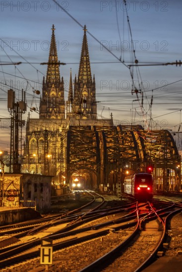 Rail track in front of Cologne Central Station, Hohenzollern Bridge across the Rhine, regional