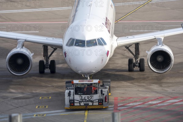 Eurowings Airbus is pushed from the gate onto the taxiway, ready to go, to Cologne/Bonn Airport,