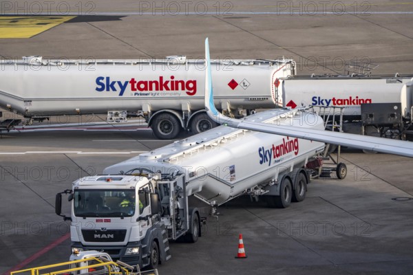 Refueling an aircraft after landing, in front of takeoff, air fuel, kerosene, Skytanking tank truck