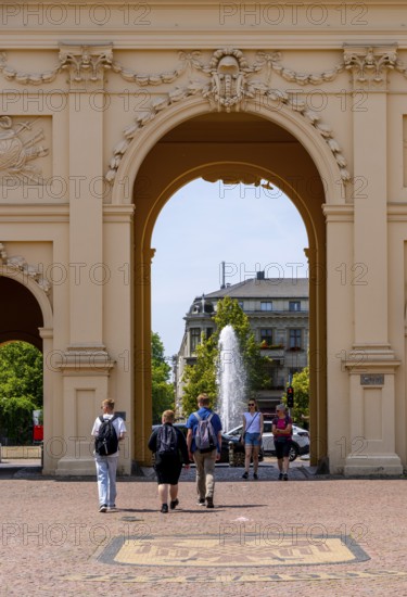 View through the Brandenburg Gate to the fountain on Luisenplatz, Potsdam, Brandenburg, Germany