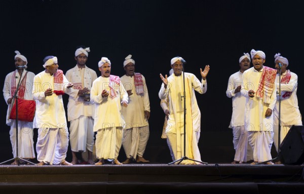 Artists perform 'Ojapali' folk song during a cultural evening program at Shilpgram Mohotsav 2026 in