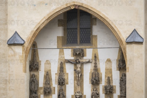Christ sculpture and remains of the former monastery church of S. Johannes Baptistam above portal