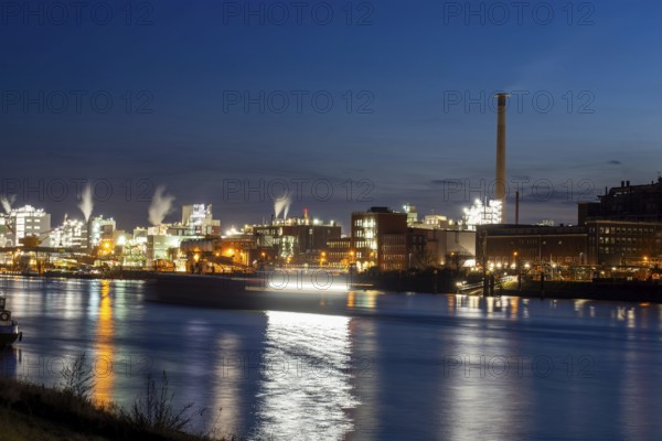 Evening shot of BASF in Ludwigshafen with the Rhine in the foreground
